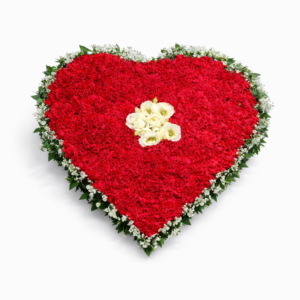 Hjärtformat begravningshjärta i rött med vit blomsterdetalj